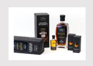 Black recycled paper packaging for “Preussischer Whisky” and “Salzatal Whisky”