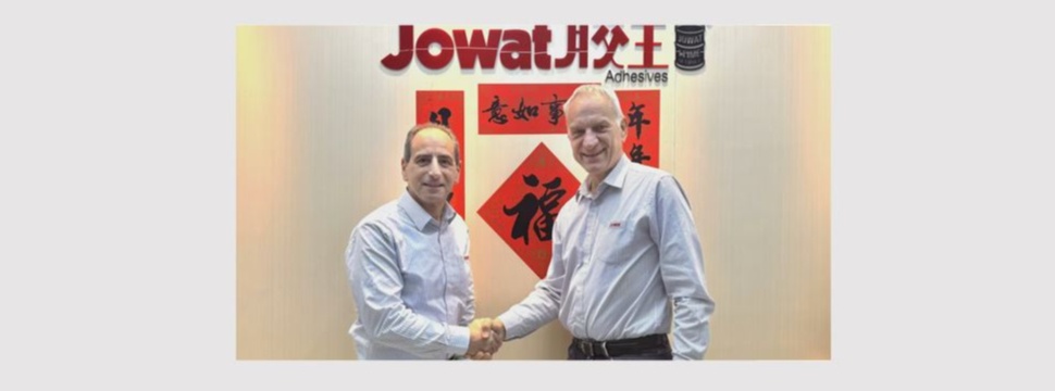 Two men shaking hands.